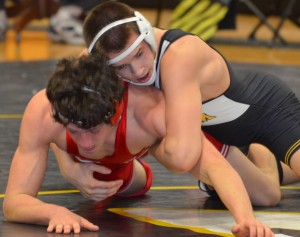 Mike Falcon wrestling in the dual meet.