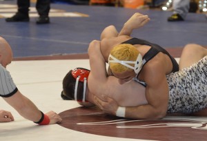 Gio Santiago pinning his opponent in the 182-pound semifinal.