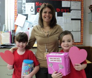 Principal DeCicco with Madison and Olivia.