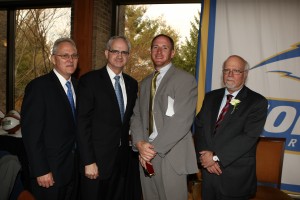 Shanahan with University officials. 