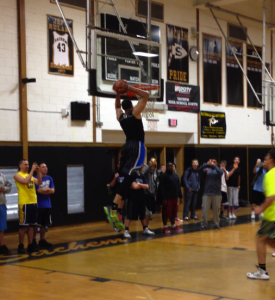 Harris throws down a dunk in the gym.