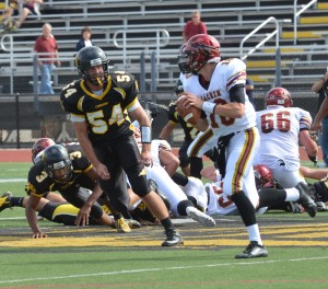 Danny Wolff looks to pass against Commack.