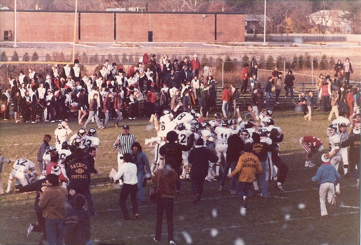 Fans, players and coaches rejoice during Sachem's first championship.