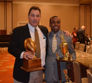 Sachem coach Dave Falco and Malik Pierre.