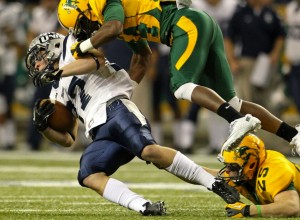 Crossan taking a tackle against North Dakota.