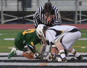 Mike Calvagna squares off for a face-off against Ward Melville.