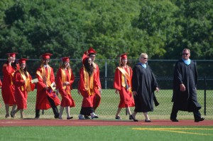 Students making their way onto the field.