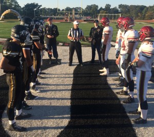 A look at the ceremonial coin toss between Sachem East and Sachem North.