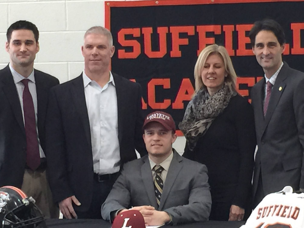 Crossan with his family at a Signing Day event at Suffield Academy.