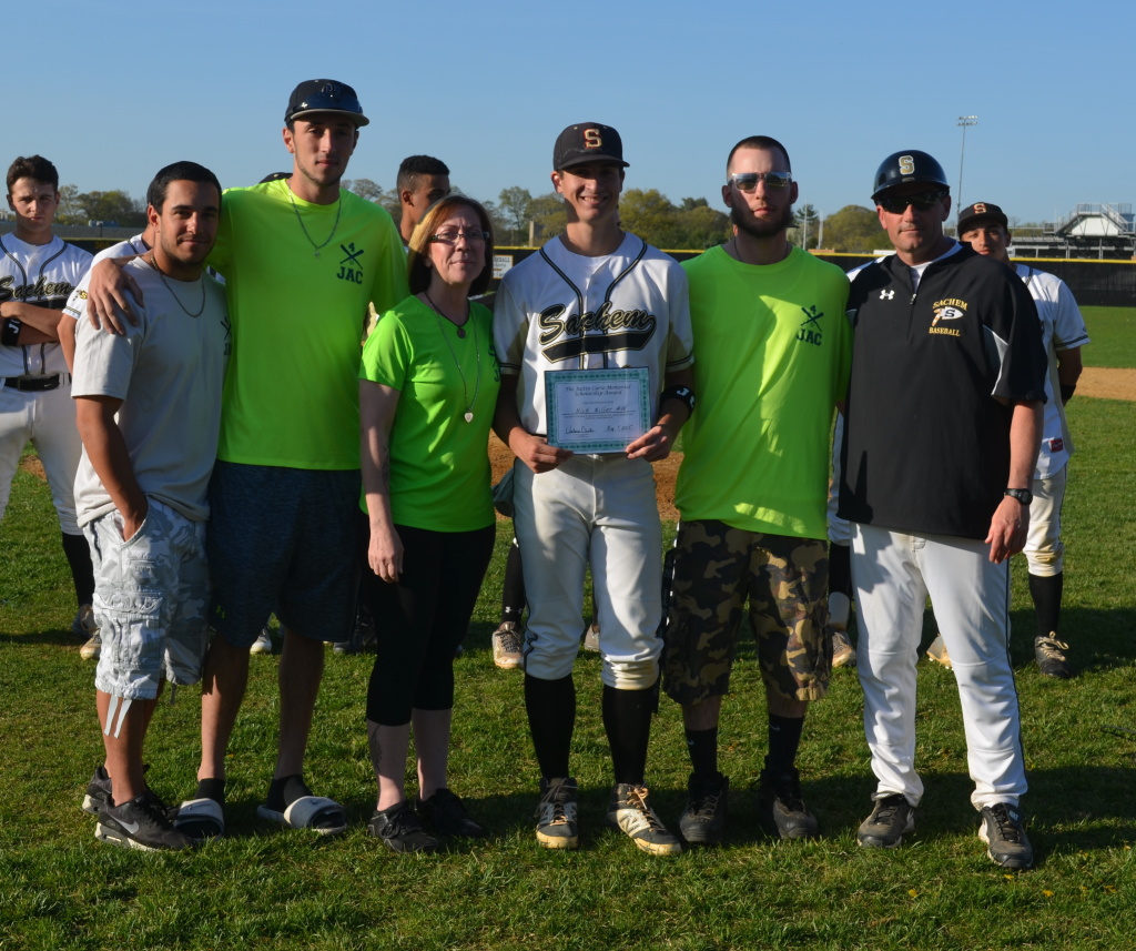 Nick Miller receives the inaugural Justin Carlo Memorial Scholarship.