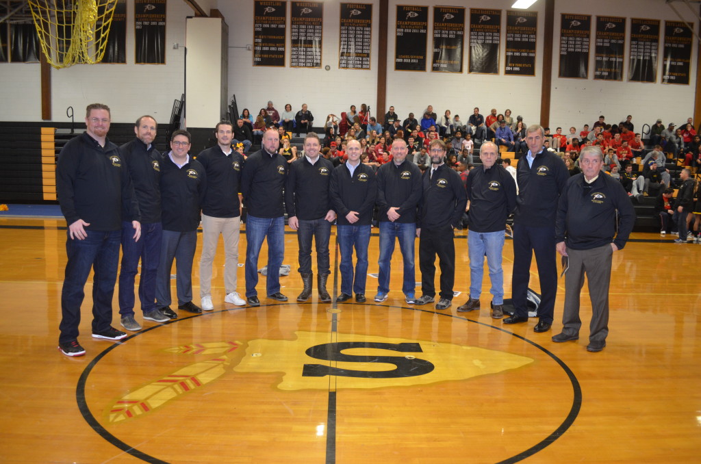 Coaches and players from Sachem's 1995-1996 Suffolk County championship basketball team honored at a 20th anniversary celebration.