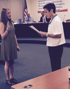Shannon getting sworn in as a student representative of the Sachem Board of Education.