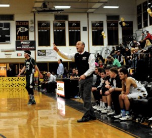 Sachem coach Tom Mullee calling plays. / Photo Credit Artie Weingartner