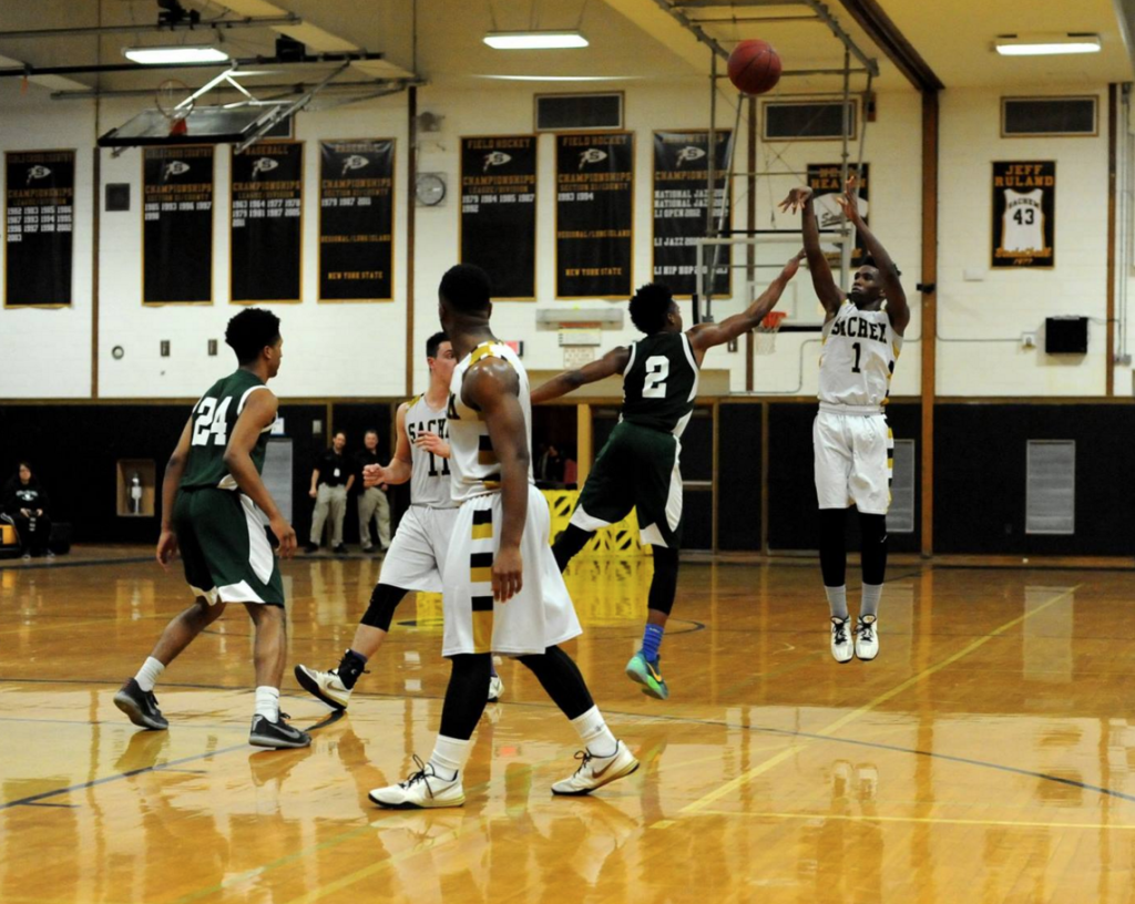 Darius Townsend takes a long-range shot. / Photo Credit Artie Weingartner